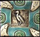 heron with fish tile